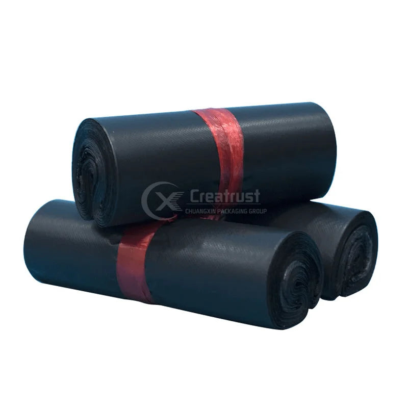 Dark blue poly mailer roll sheets with red binding bands