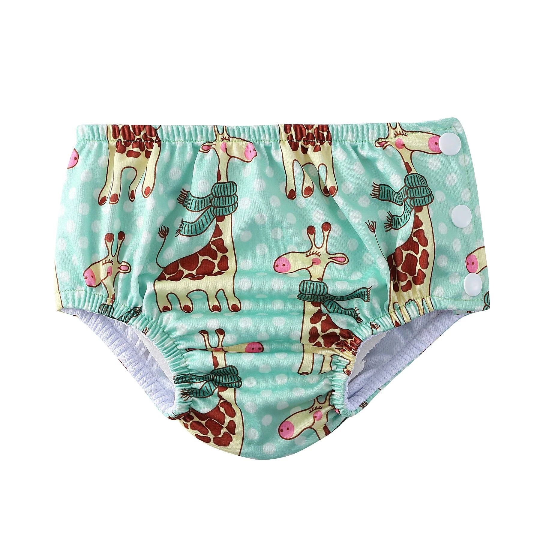 Reusable baby swim diaper in teal with a cute giraffe and polka dot print and snap button side closures.