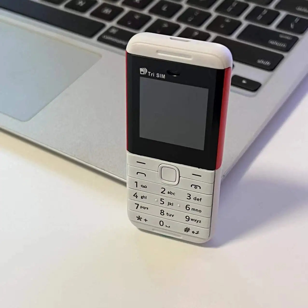 SERVO BM5310 Mini 3 SIM Standby Feature Mobile Phone Speed Dial Magic Voice Blacklist MP4 Player FM Radio Small Backup Cellphone