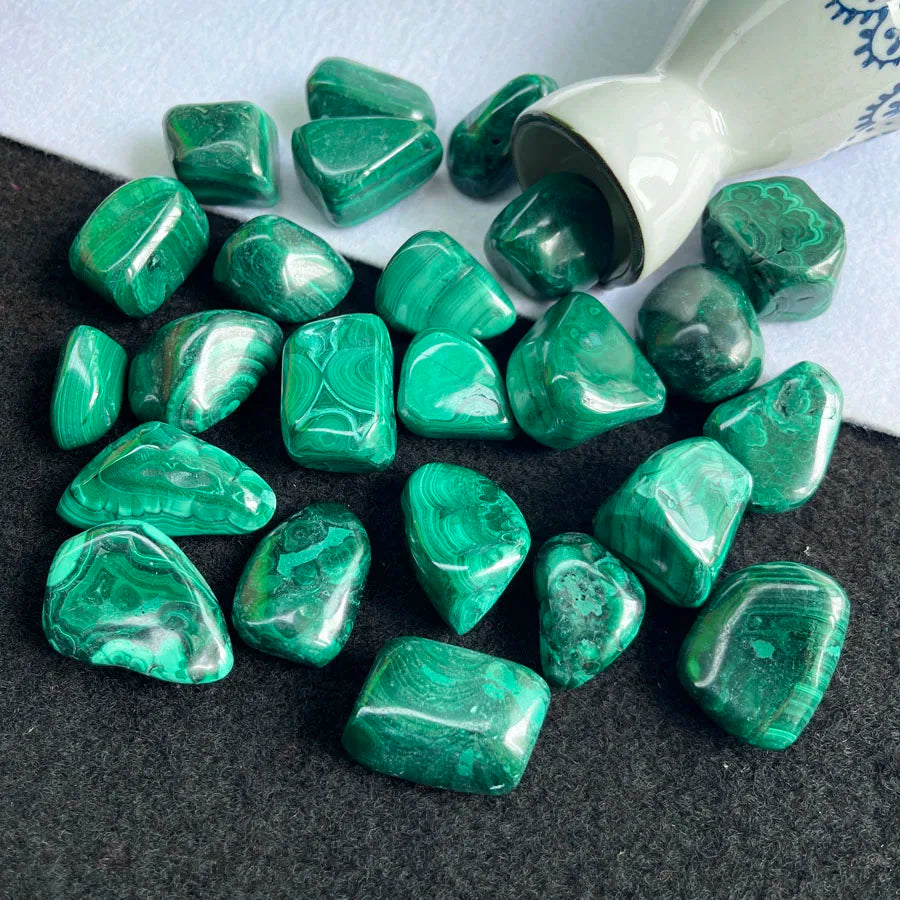 Tumbled malachite stones, glossy dark green heart and teardrop shapes