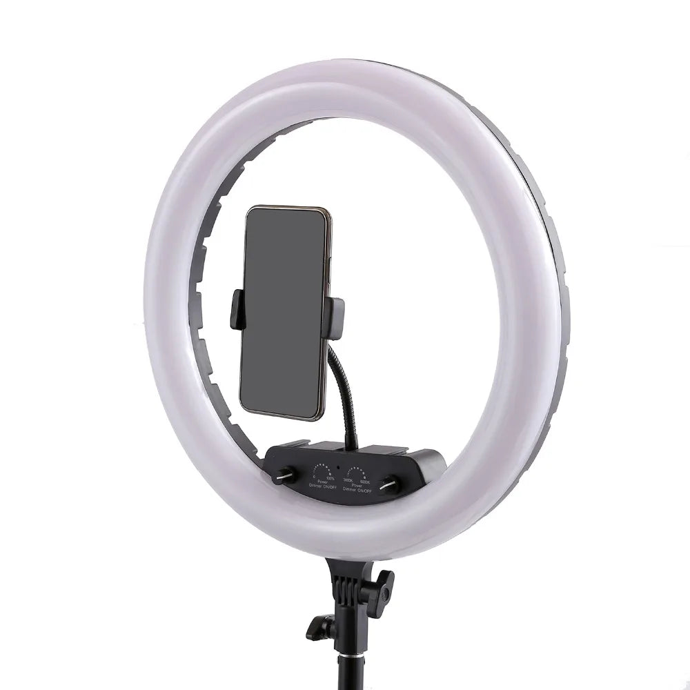Large circular LED ring light with adjustable brightness controls and a central smartphone mount on a black stand.