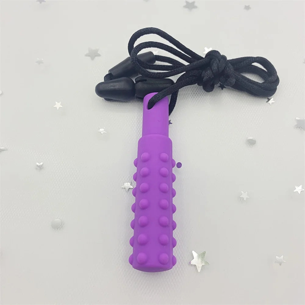 Purple silicone teething toy pendant on a black cord for baby teething relief.