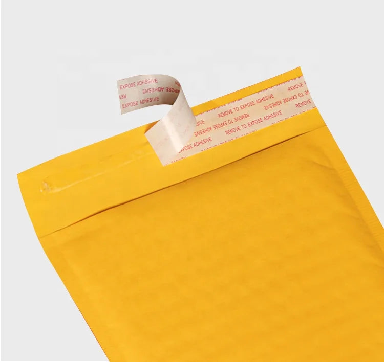 Yellow padded mailing envelope with fold-over flap and white interior backing