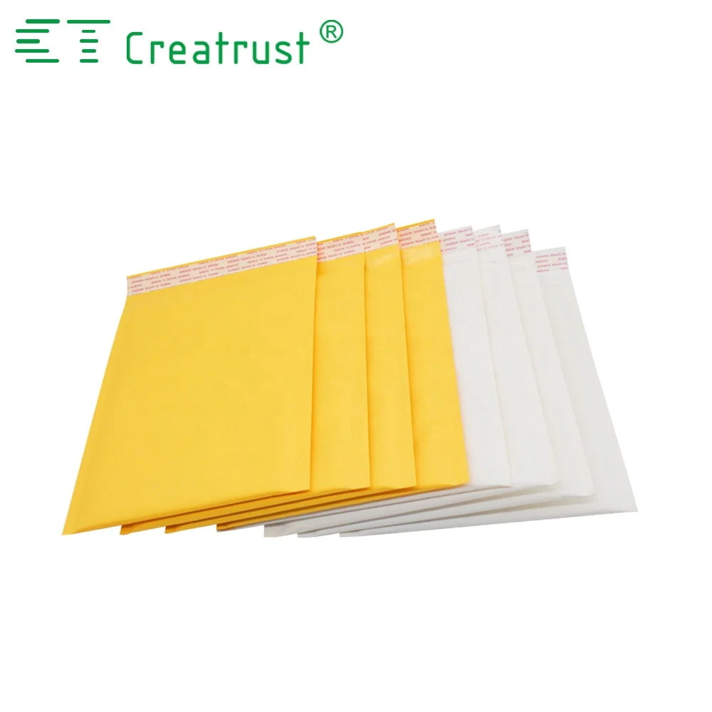 Yellow and white padded mailing envelopes layered together with printed flap tabs