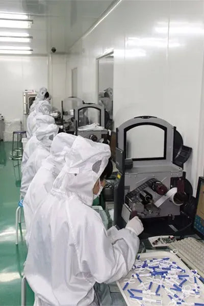 Industrial barcode scanning station with protective workers and large scanner unit