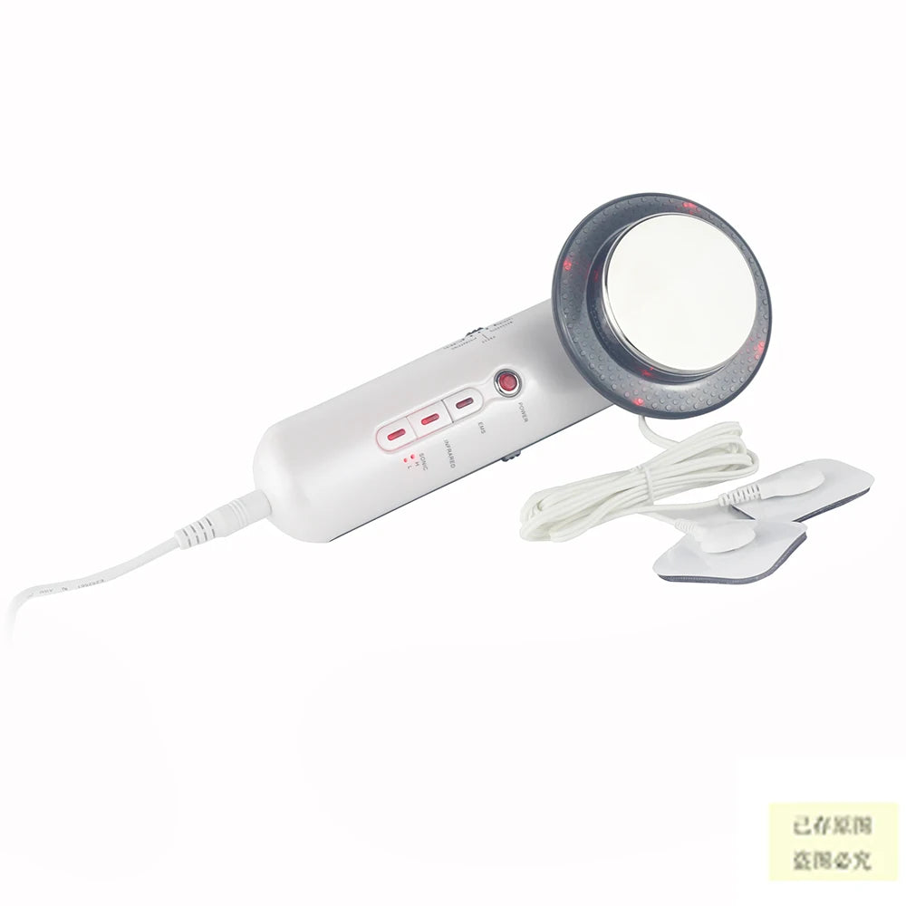 White 3-in-1 ultrasonic body slimming massager with metal treatment head, control buttons, and two EMS electrode pads.
