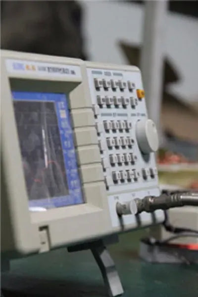 Desktop barcode scanner control panel with buttons and display screen