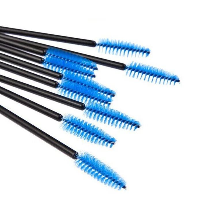 Disposable mascara wands with thin black plastic handles and bright blue spiral brush heads for applying lash makeup.