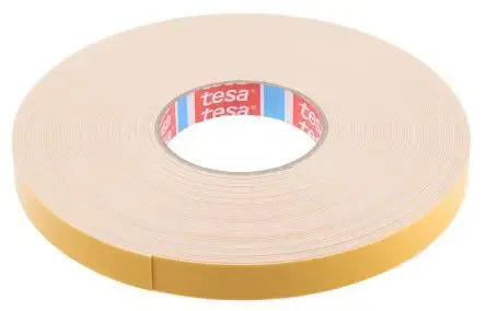 Foam mounting tape roll with center cutout, tan tape with TESA branding