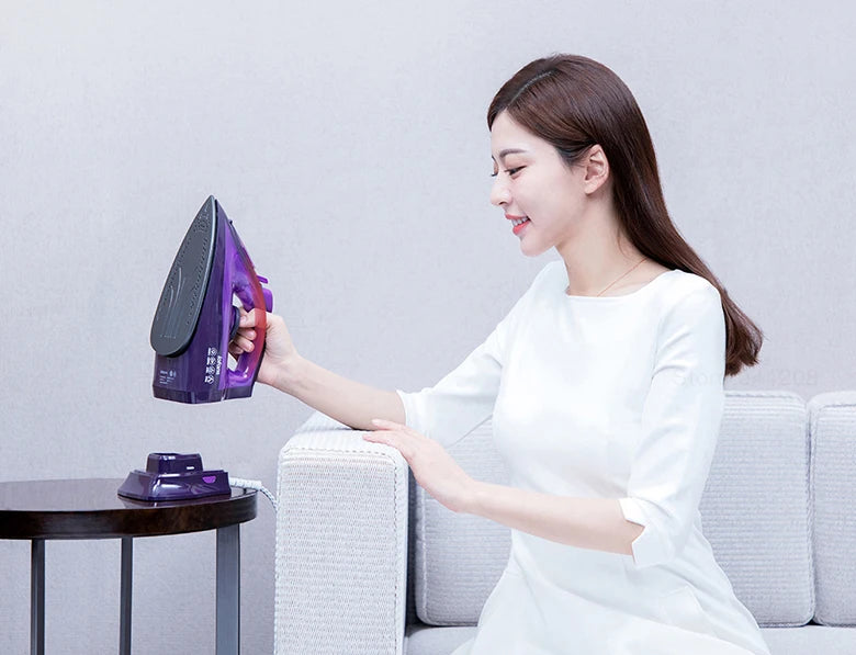 Tidesmit Lofans YD-012V cordless steam iron showing 280ml water tank and fast warm-up features for garment care.