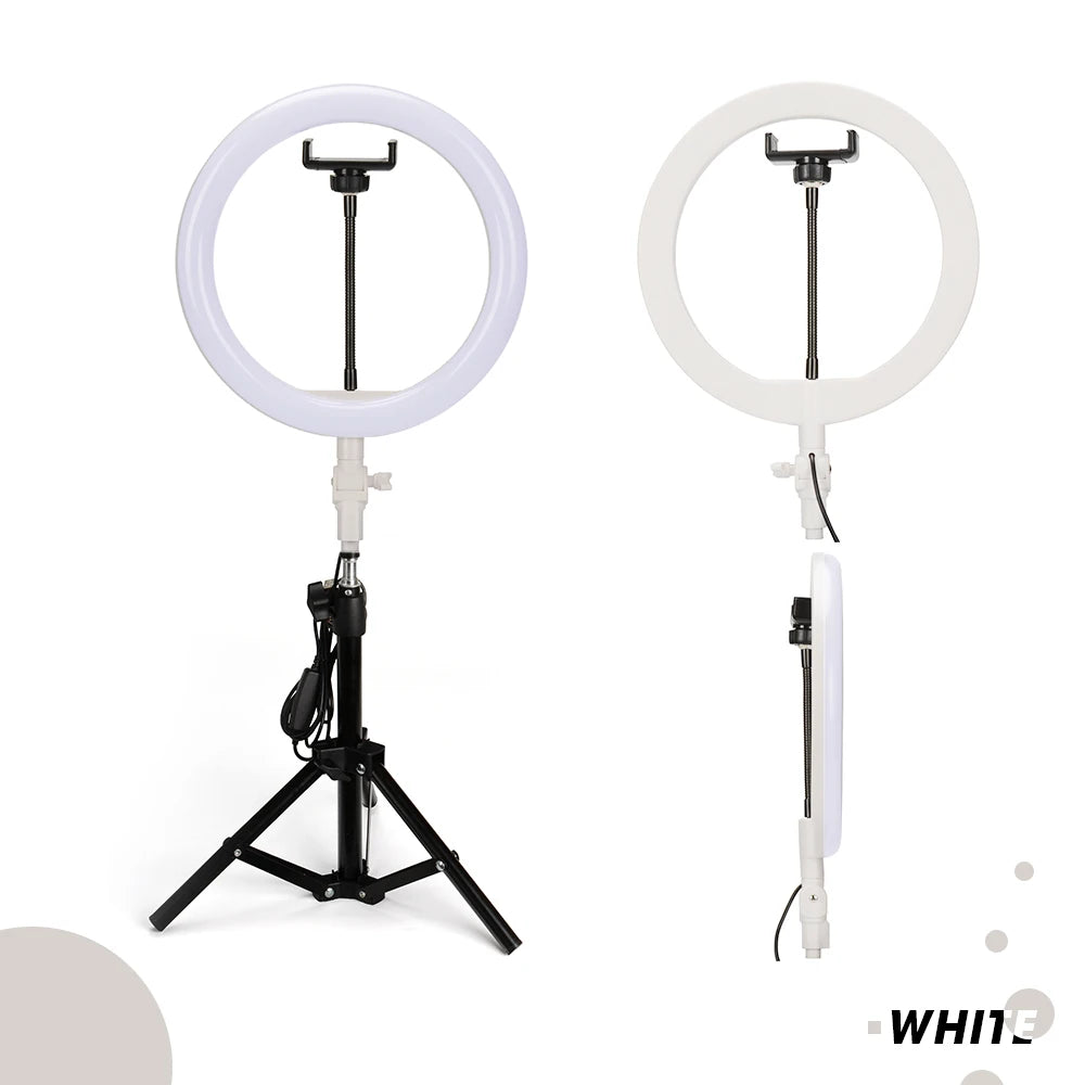 White circular LED ring light with phone holder on a black tripod stand for photography and video lighting.
