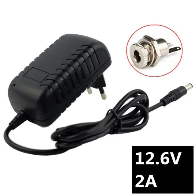 Tidesmit black plastic 12.6V 2A battery charger with ribbed power brick, charging cable, and metal DC barrel jack port.