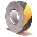 Non-slip safety grip tape roll with gray backing and black-and-yellow diagonal grip stripes