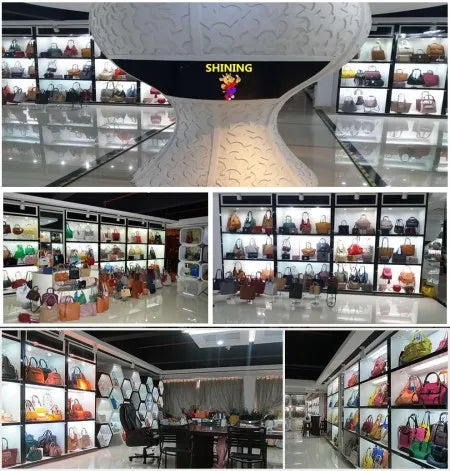 Wholesale luxury leather messenger bags and trunks in a plaid boutique showroom featuring various colorful handbags.