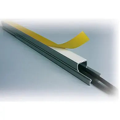 Foam mounting tape strip fitted in a dark U-channel clip