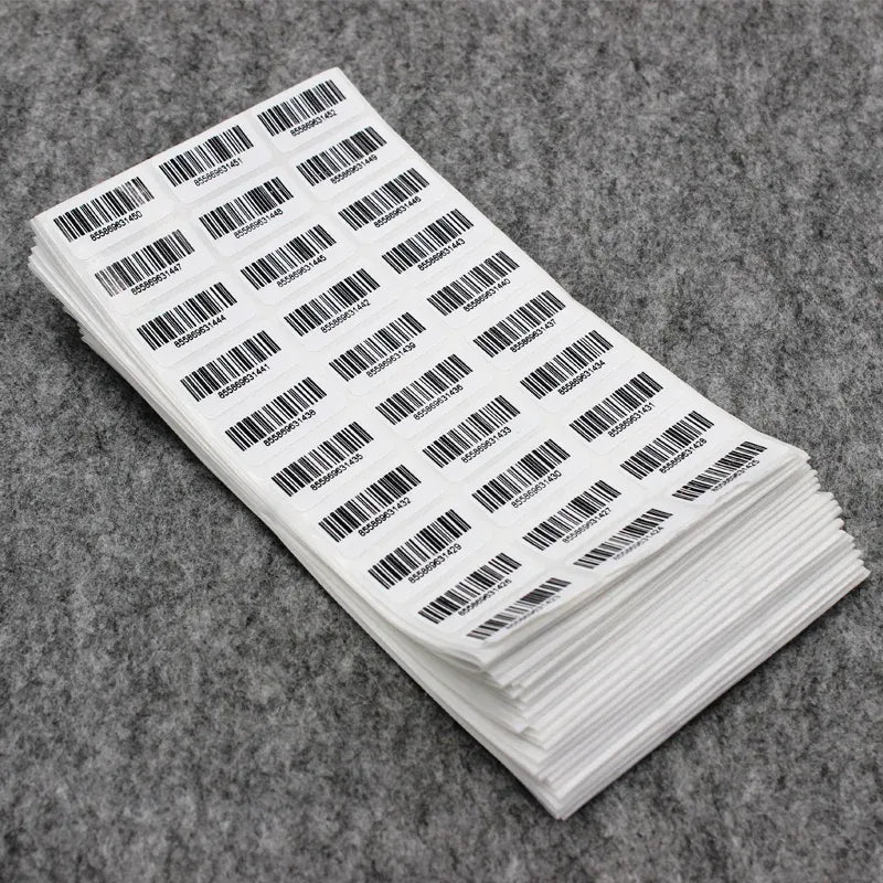 Pack of barcode inventory stickers, white sheets with black barcode labels