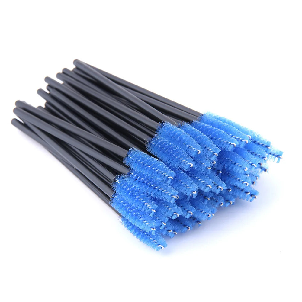 Disposable mascara wands with flexible blue nylon bristles and thin black plastic handles for eyelash application.
