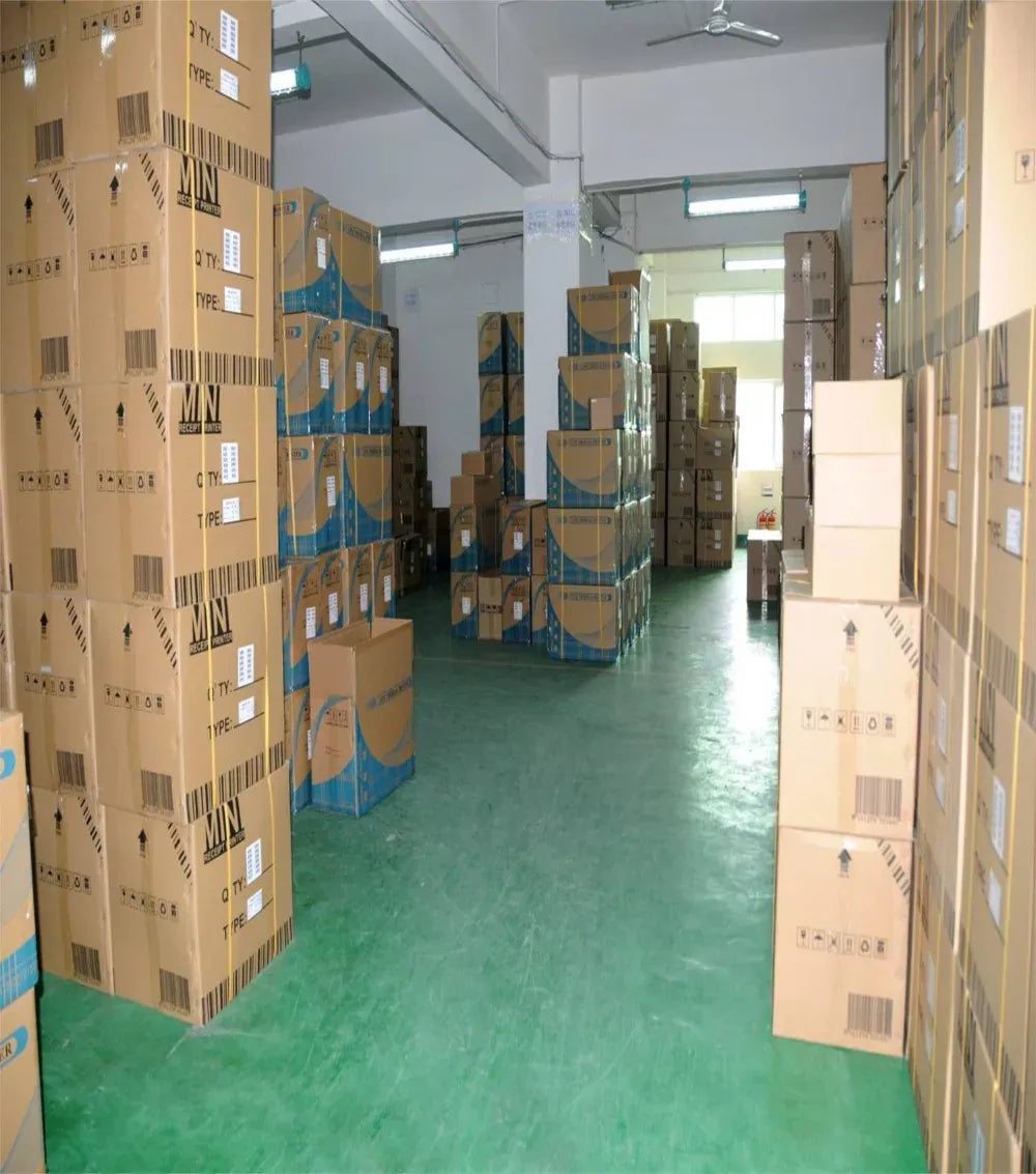 Warehouse hallway with stacked carton boxes for thermal printers