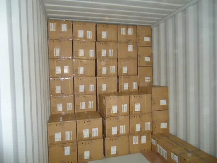 Bulk shipping cardboard trunks packed inside a container for oil wax canvas motorcycle saddle bag delivery.