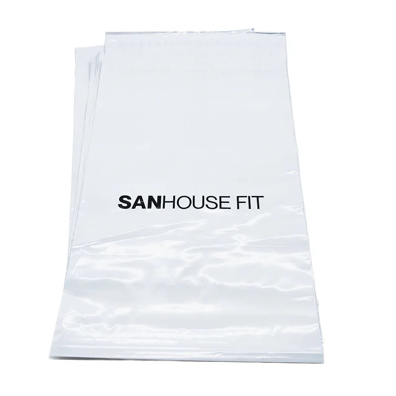 White poly mailer bag with SANHOUSE FIT text in black, glossy surface