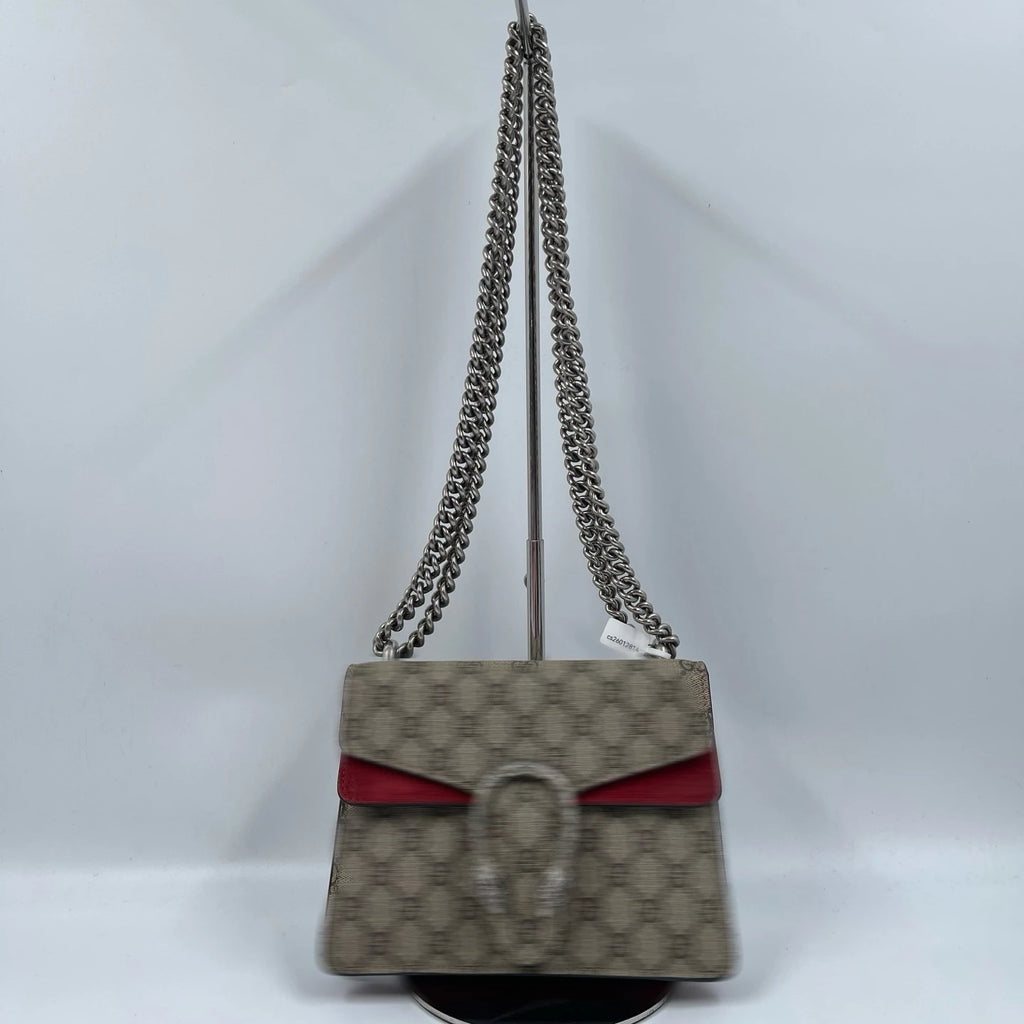 Pre-owned designer shoulder bag in beige monogram canvas with red leather trim and silver chain strap.