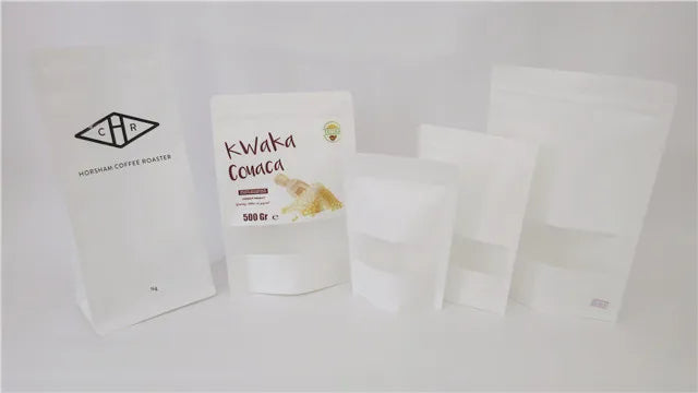 White storage bags with printed labels and sealed tops