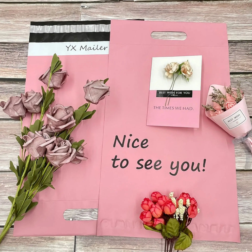 Pink plastic mailing bag with handle cutout and “Nice to see you!” message