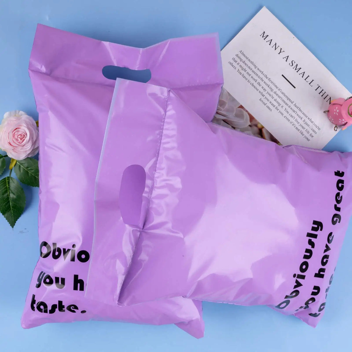 Lavender poly mailer bag with top handle cutout, stacked and “Obviously you have great taste” text.