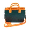 Dark green waterproof EVA trunk tote with orange handles, shoulder strap, and charm holes for DIY accessory decoration.