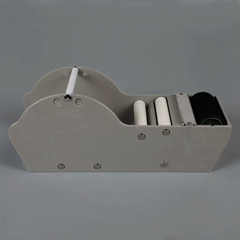 Gray tape dispenser front view with roller bars and black adhesive tape roll compartment