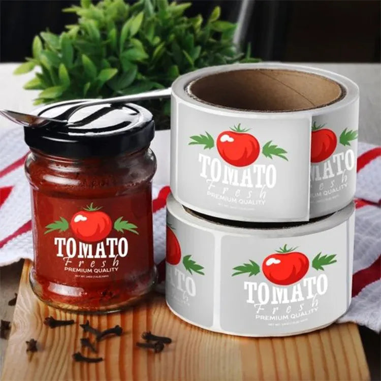 Printed sticker label roll and jar labels with tomato graphics and text