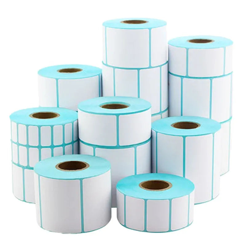 Multiple barcode label rolls, white labels with light blue edges