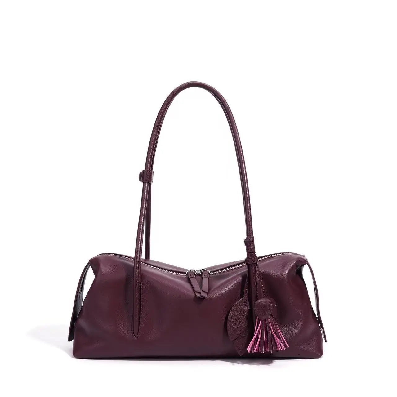 Burgundy genuine cowhide leather trunk shoulder bag with a zipper closure, adjustable strap, and decorative tassel.