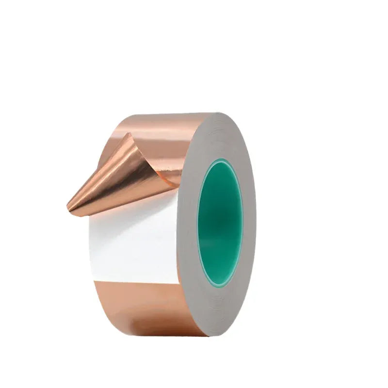 Self-adhesive copper foil tape roll with copper strip on gray backing