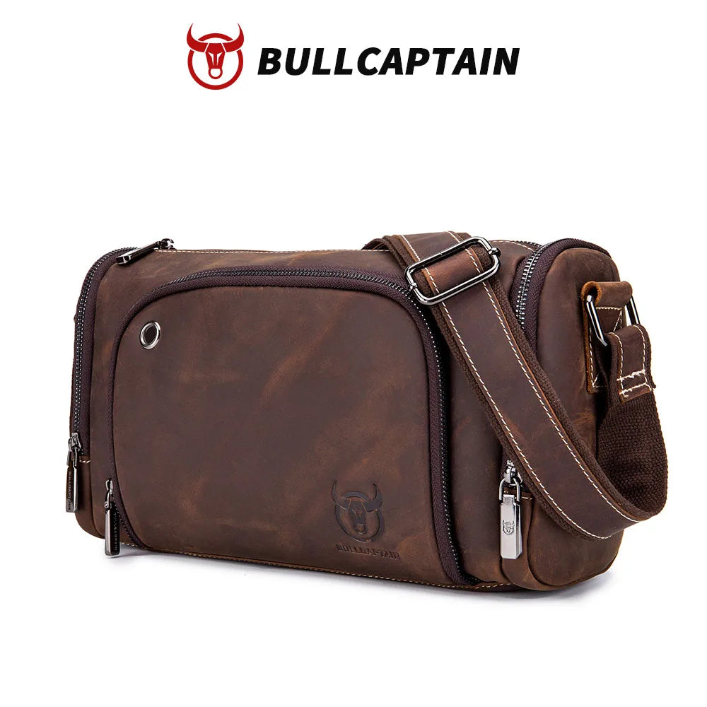 BULLCAPTAIN brown cowhide leather cylinder crossbody bag with adjustable shoulder strap and zipped compartments.