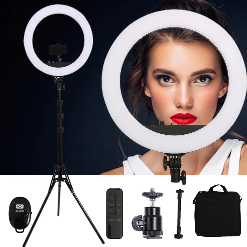 Large white LED ring light on a black adjustable tripod stand with remote control, phone mount, and carrying case.