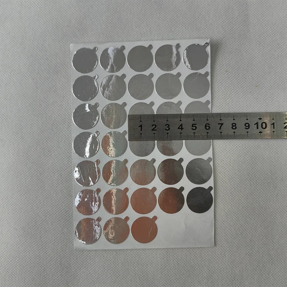 Aluminum seal sticker sheets with round seals in silver and copper tones