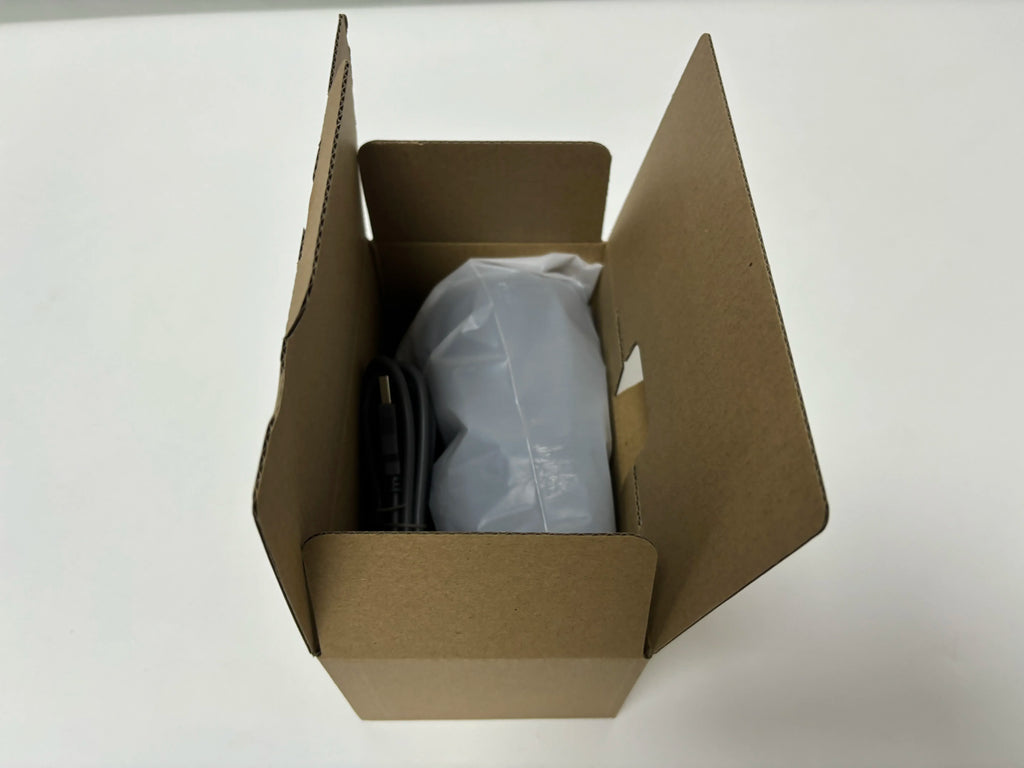 Barcode scanner packaging box with scanner and protective plastic inside