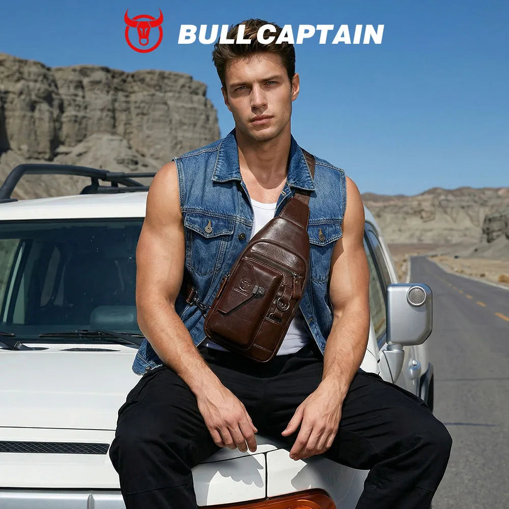 Brown genuine leather Bullcaptain sling bag with front zipper pockets worn crossbody by a man in denim trunks.