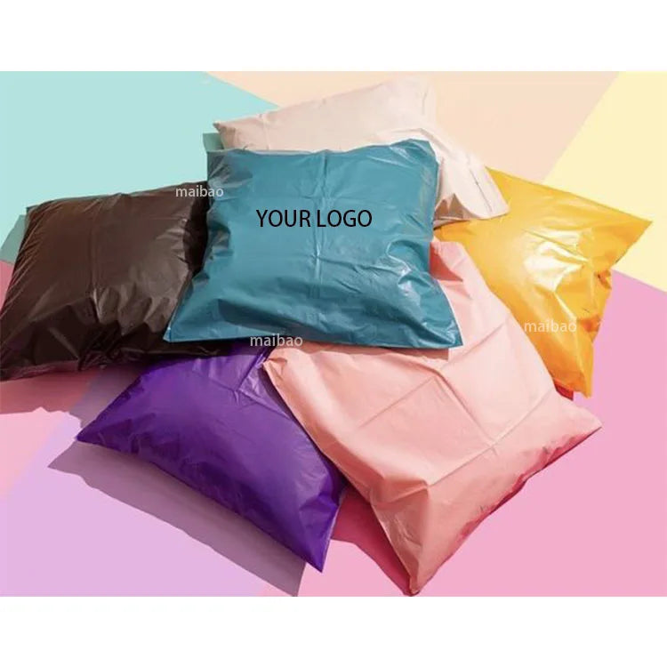 Assorted pastel poly mailers stacked, each printed with 'YOUR LOGO'