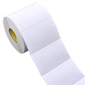White label roll with blank rectangular label tape, shown from the side.