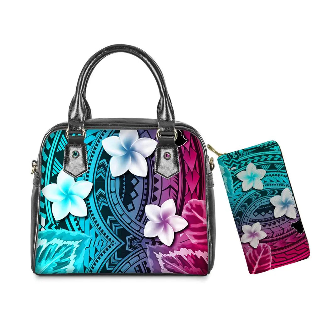 Colorful Polynesian tribal print leather handbag and wallet set with plumeria flowers, teal and magenta gradient.