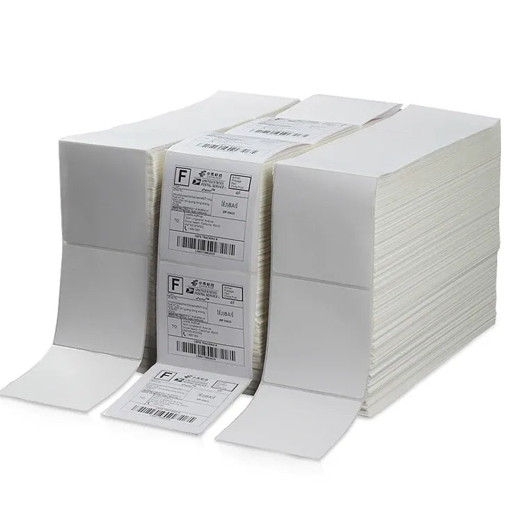 White thermal shipping label fanfold stack with multiple barcoded label sheets