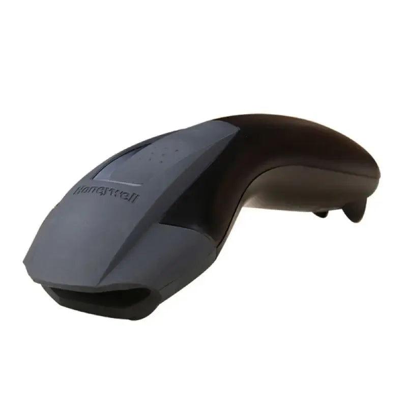 Close-up of black handheld barcode scanner head and top sensor window