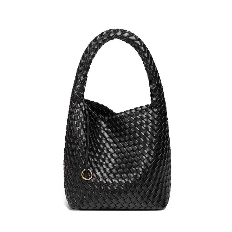 Black woven PU leather bucket bag with top handle and minimalist gold ring detail for everyday style.