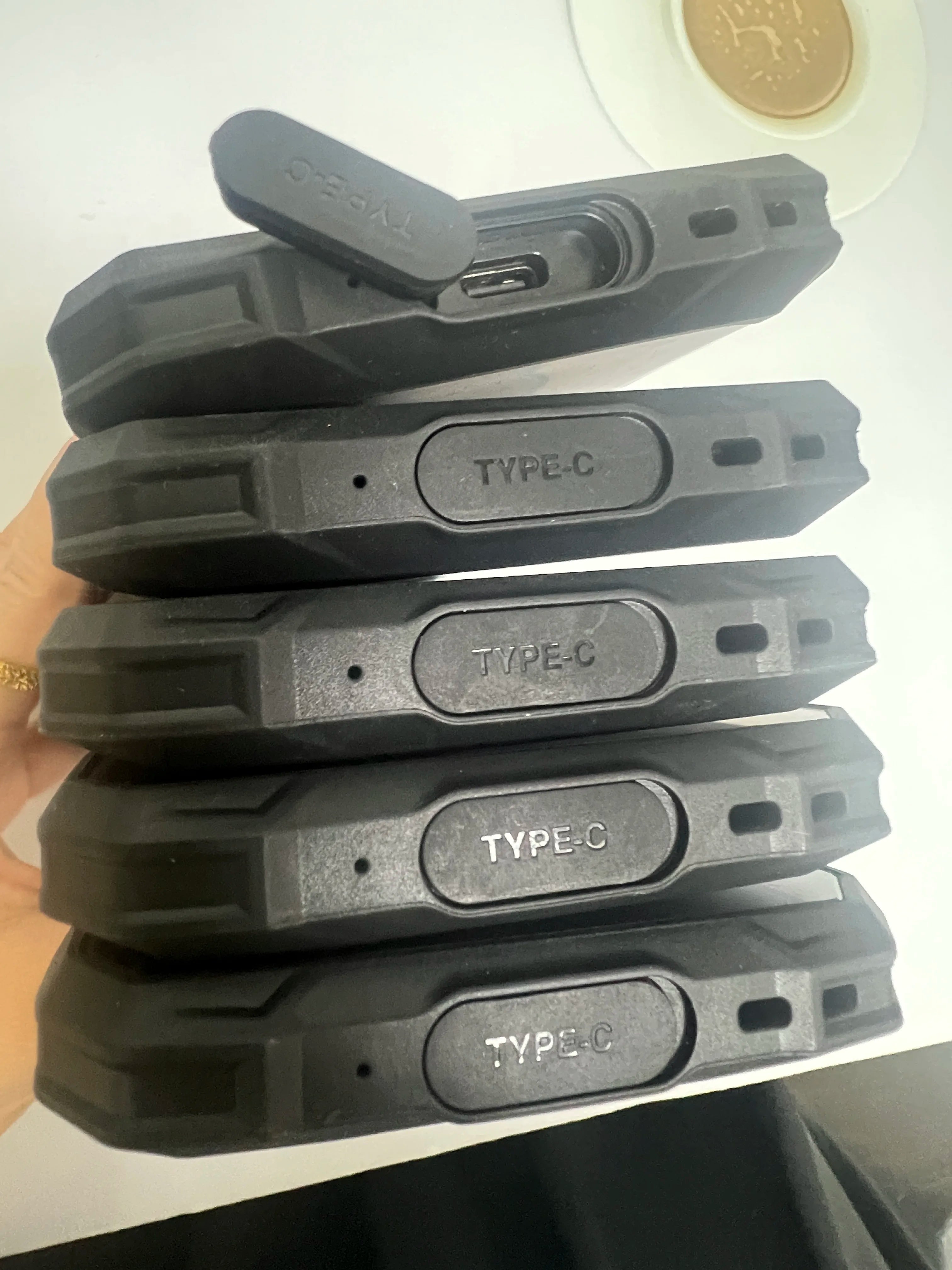 Close-up of Tidesmit X27 Ultra smartphone showcasing premium metallic frame, precise button tactile, and USB-C port.