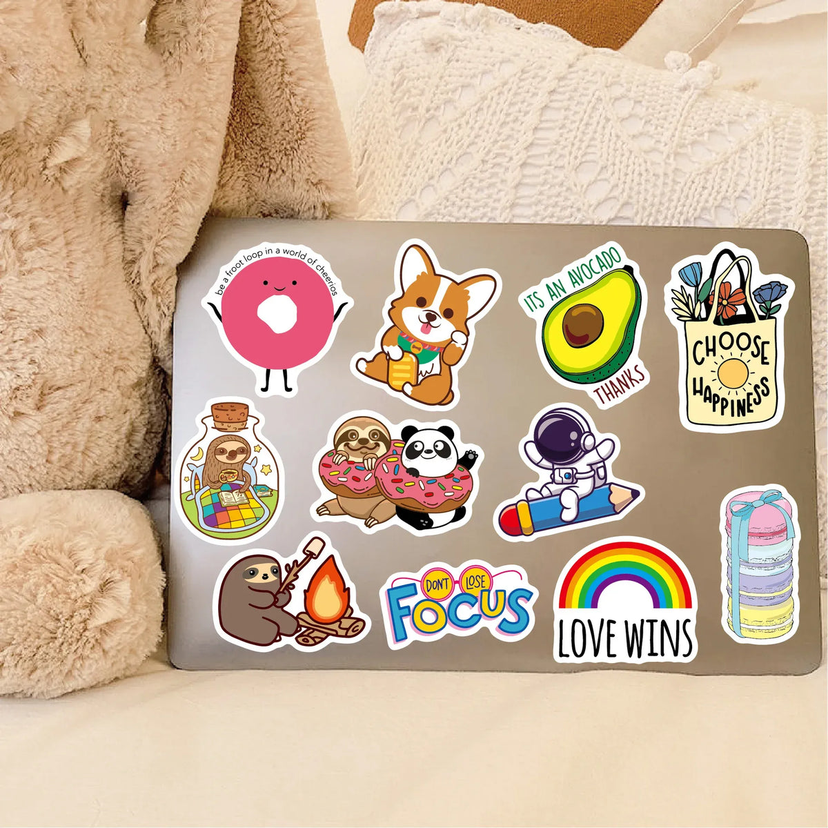 Waterproof sticker sheet with animals, avocado, rainbow, and motivational text