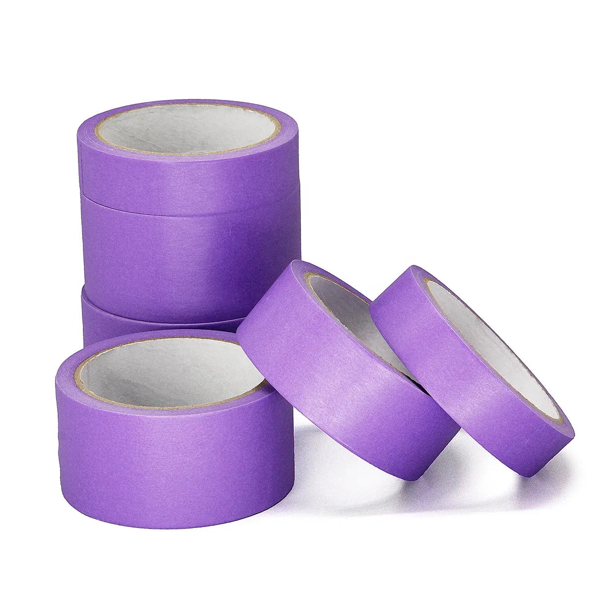 Purple masking tape rolls with two loose rolls and three rolls stacked in back.