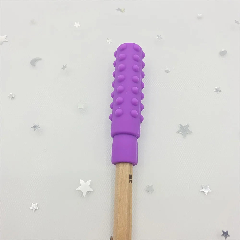 Purple silicone teething toy topper for pencils to help soothe baby teething pain.