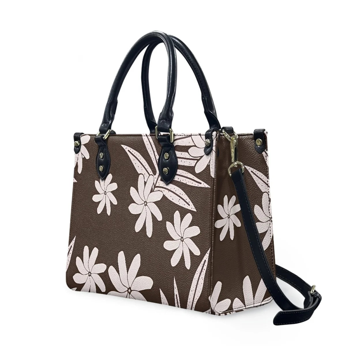 Brown leather handbag with white Polynesian tribal floral print, black handles, and detachable shoulder strap.